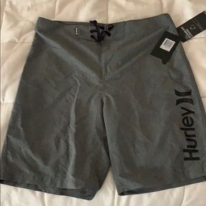 Hurley bathing suit size 32 length 21”. Never worn